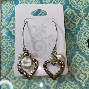 Silver-toned drop earrings with faux pearls​